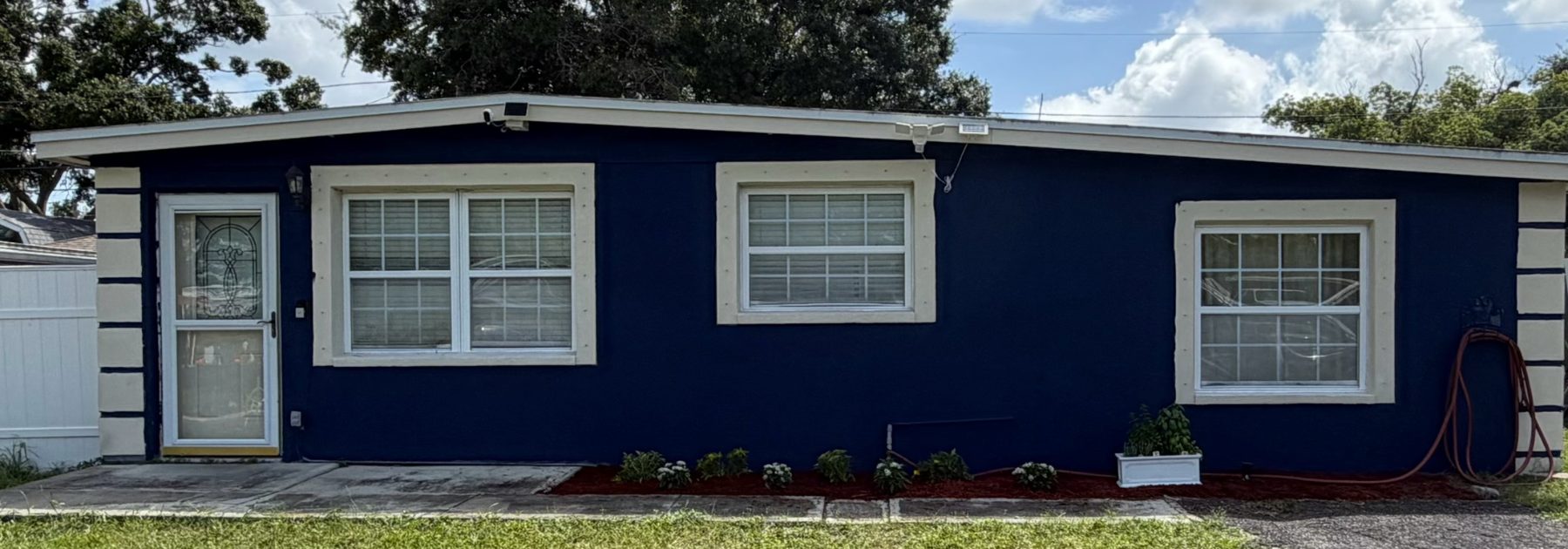 Renovated C.A.L.I. home with fresh paint and landscaping