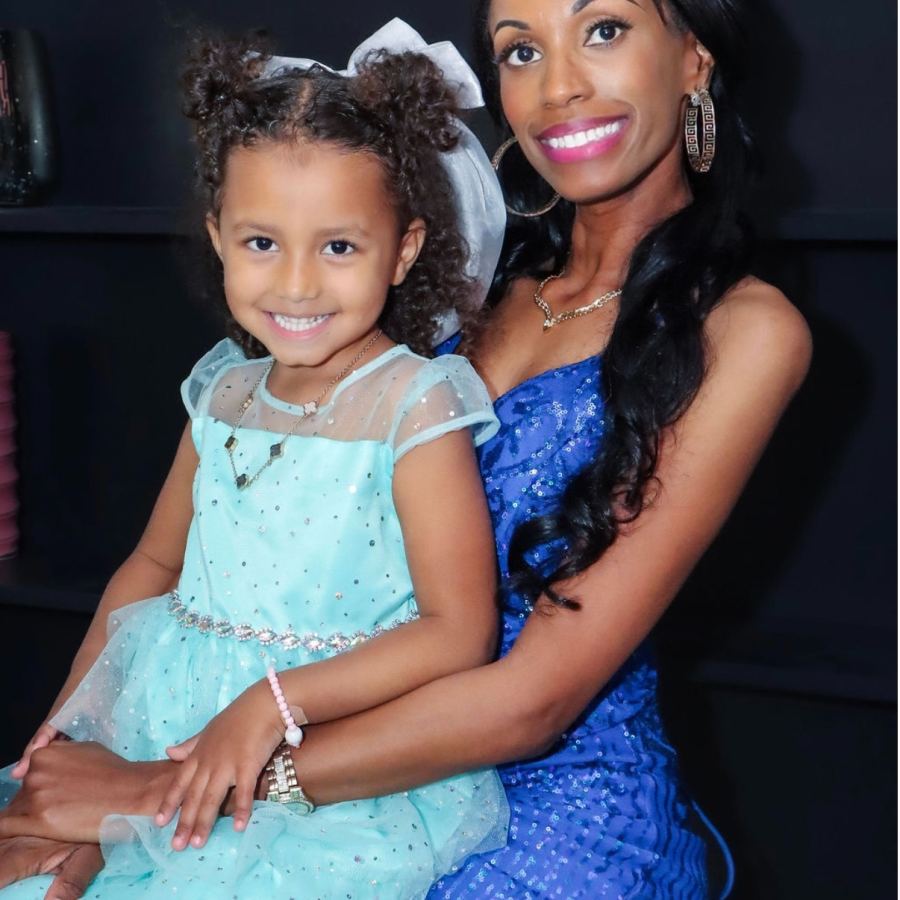 Young guest in a blue dress at the gala