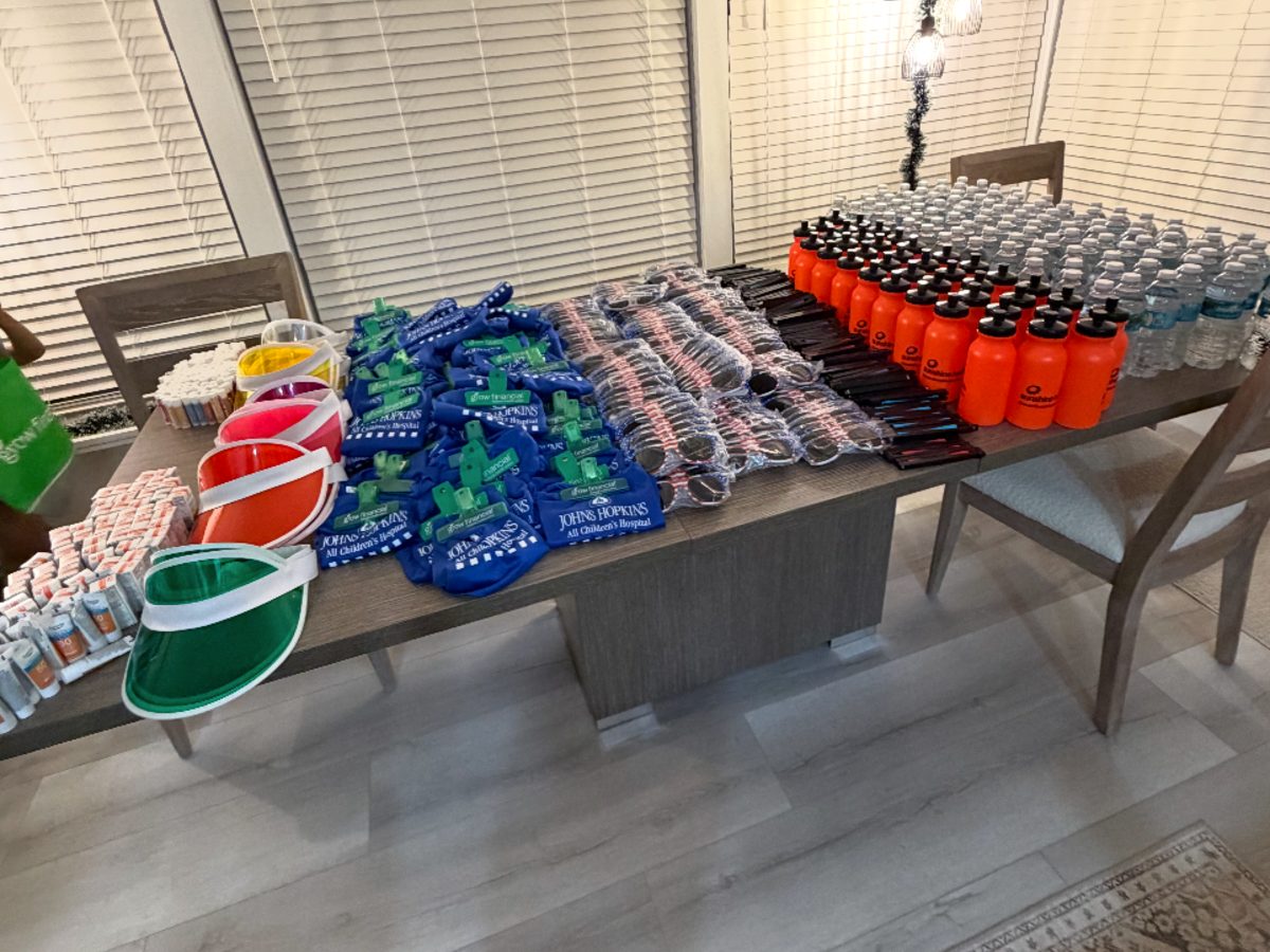 Summer heat-relief supplies including water, visors and sunscreen