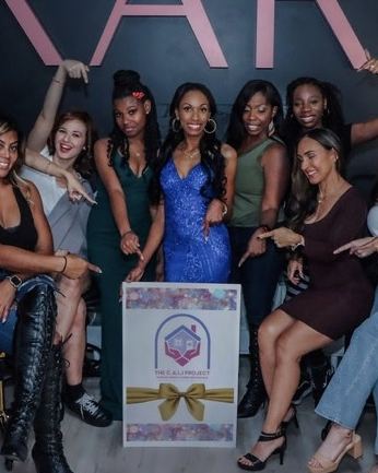 C.A.L.I. Project supporters celebrating together at an event